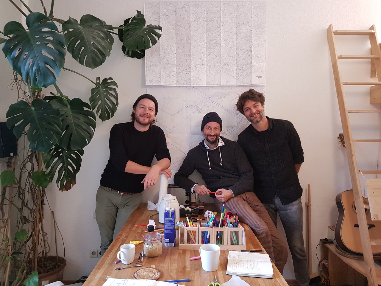 The designers of the MicroMacro: Crime City in a studio