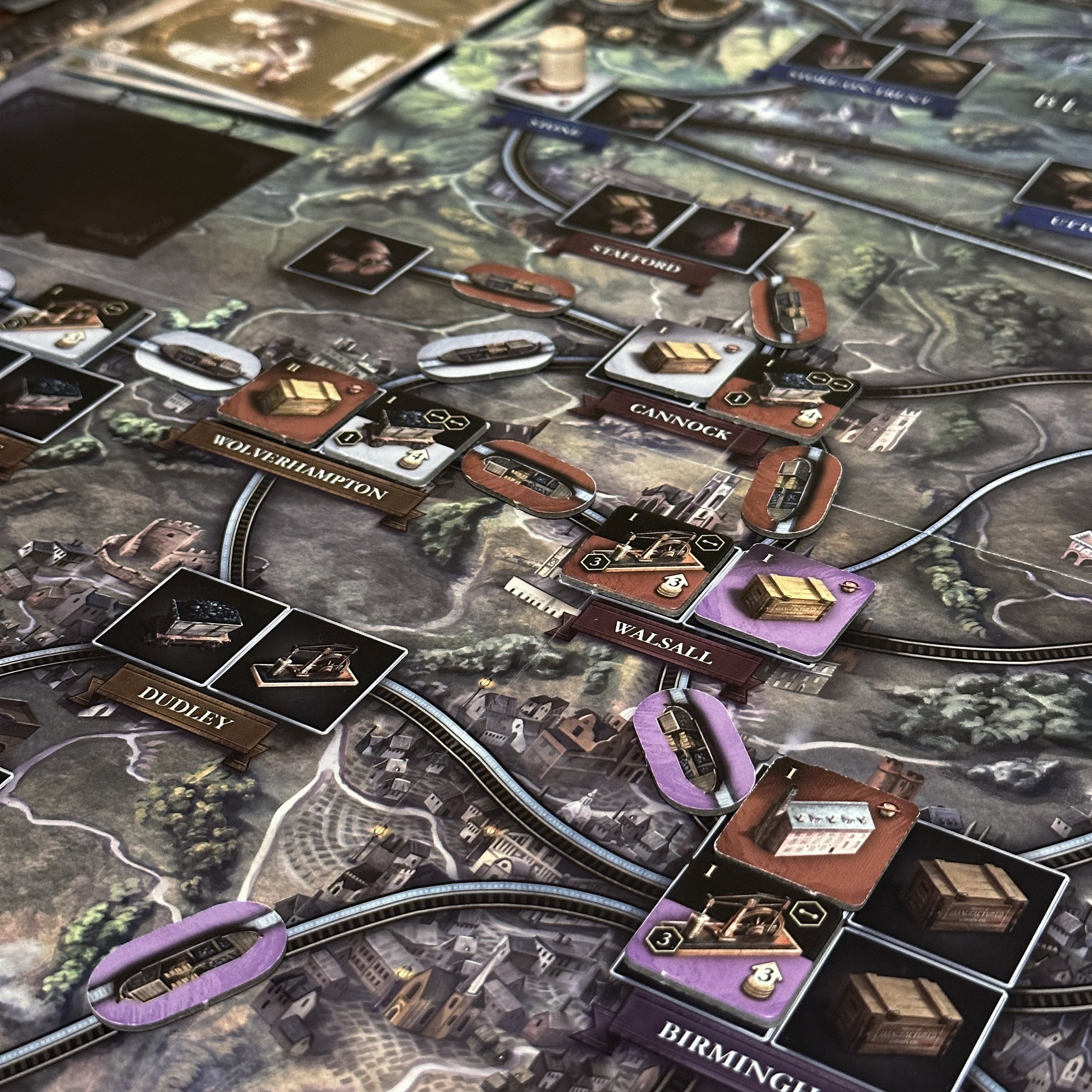 Close detail of Brass: Birmingham board with pieces on it