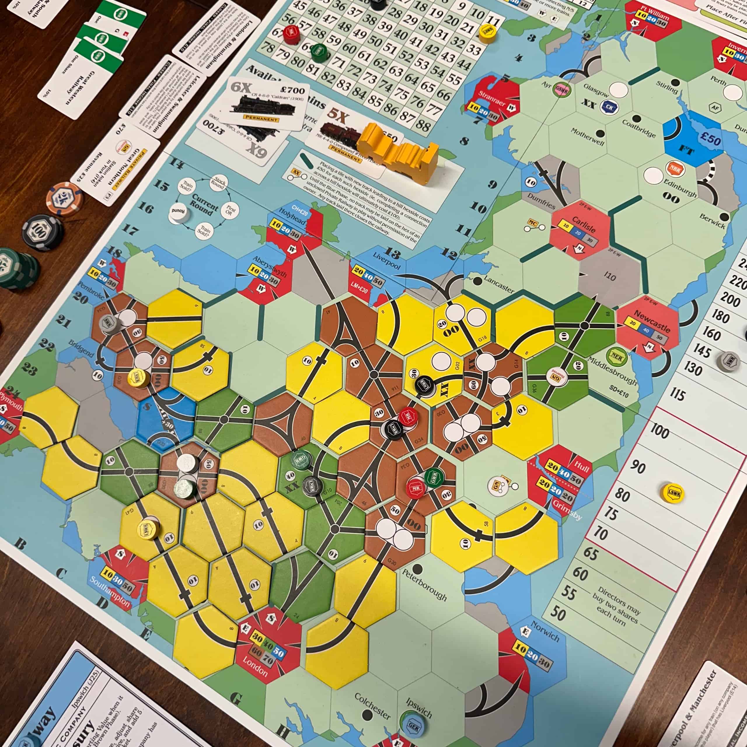 18GB two-player E-W game end situation. South Wales to Bristol is brown tiles, as is southern Midlands. There's one yellow XX and one OO tile in the northern Midlands. Main routes were London-Pembroke, London-Holyhead and London-Newcastle.